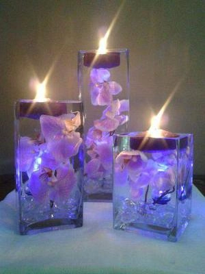 جاشمعی شیشه ای با گل های بنفش