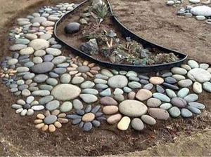 دیزاین باغچه با سنگ به صورت گل